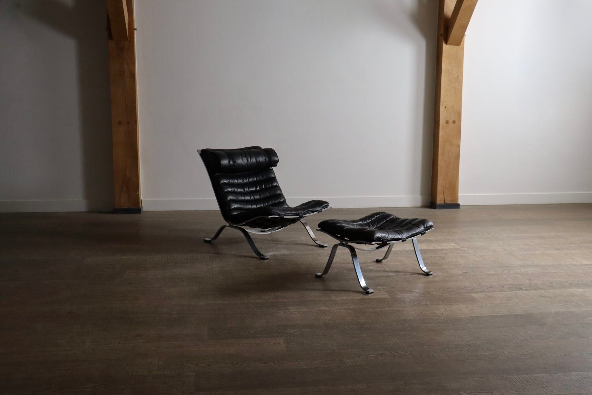 Ari_Lounge_Chair_with_Ottoman_by_Arne_Norell_in_Black_Leather_from_1966_Sweden