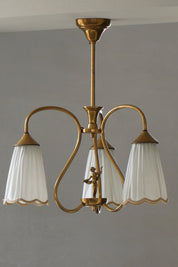 Art_Nouveau_Brass_Chandelier_with_Figural_Detail_and_Pleated_Shades