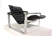 Asko_Pulkka_leather_lounge_chair_by_Ilmari_Lappalainen,_1960