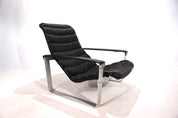 Asko_Pulkka_leather_lounge_chair_by_Ilmari_Lappalainen,_1960