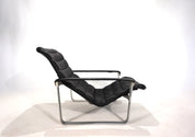 Asko_Pulkka_leather_lounge_chair_by_Ilmari_Lappalainen,_1960