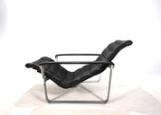 Asko_Pulkka_leather_lounge_chair_by_Ilmari_Lappalainen,_1960
