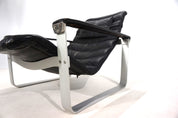 Asko_Pulkka_leather_lounge_chair_by_Ilmari_Lappalainen,_1960