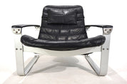 Asko_Pulkka_leather_lounge_chair_by_Ilmari_Lappalainen,_1960