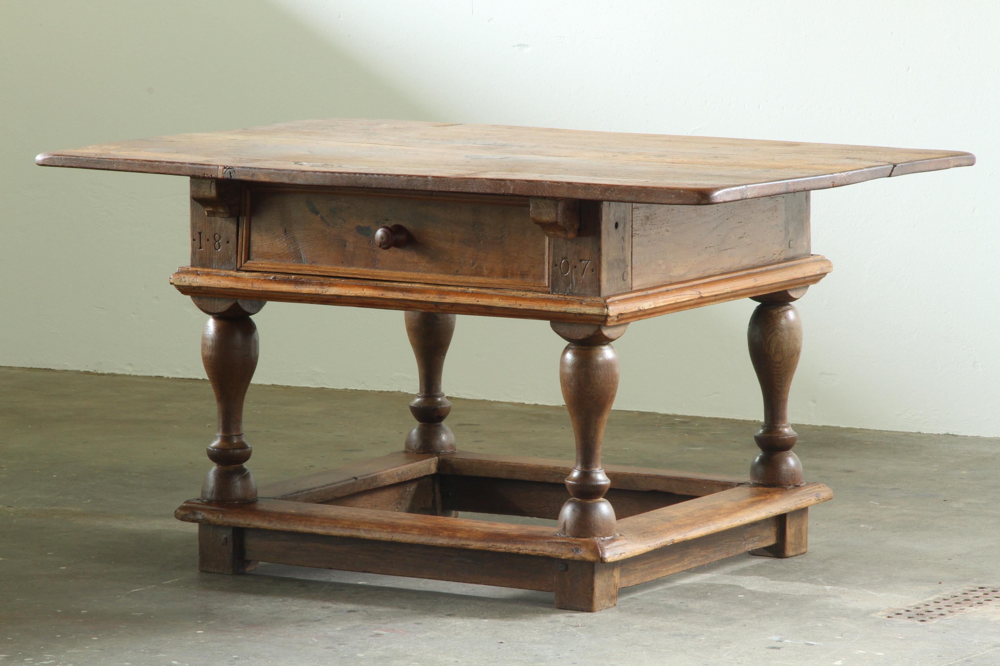 Antique_Solid_Oak_Farmhouse_Tavern_Table_with_Baroque_Details_and_Drawer