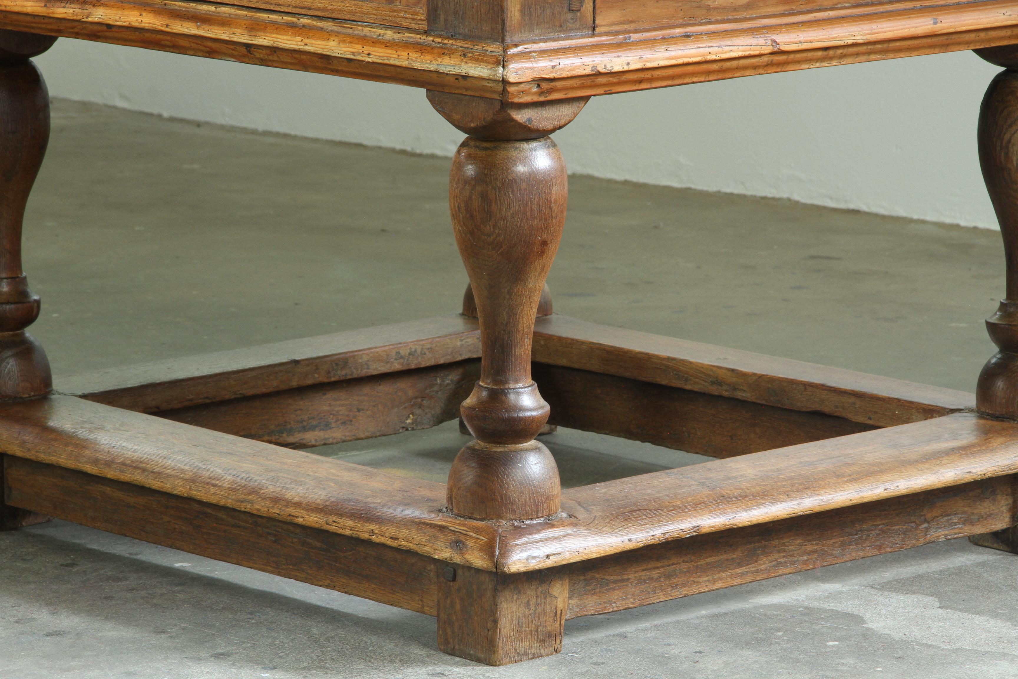 Antique_Solid_Oak_Farmhouse_Tavern_Table_with_Baroque_Details_and_Drawer