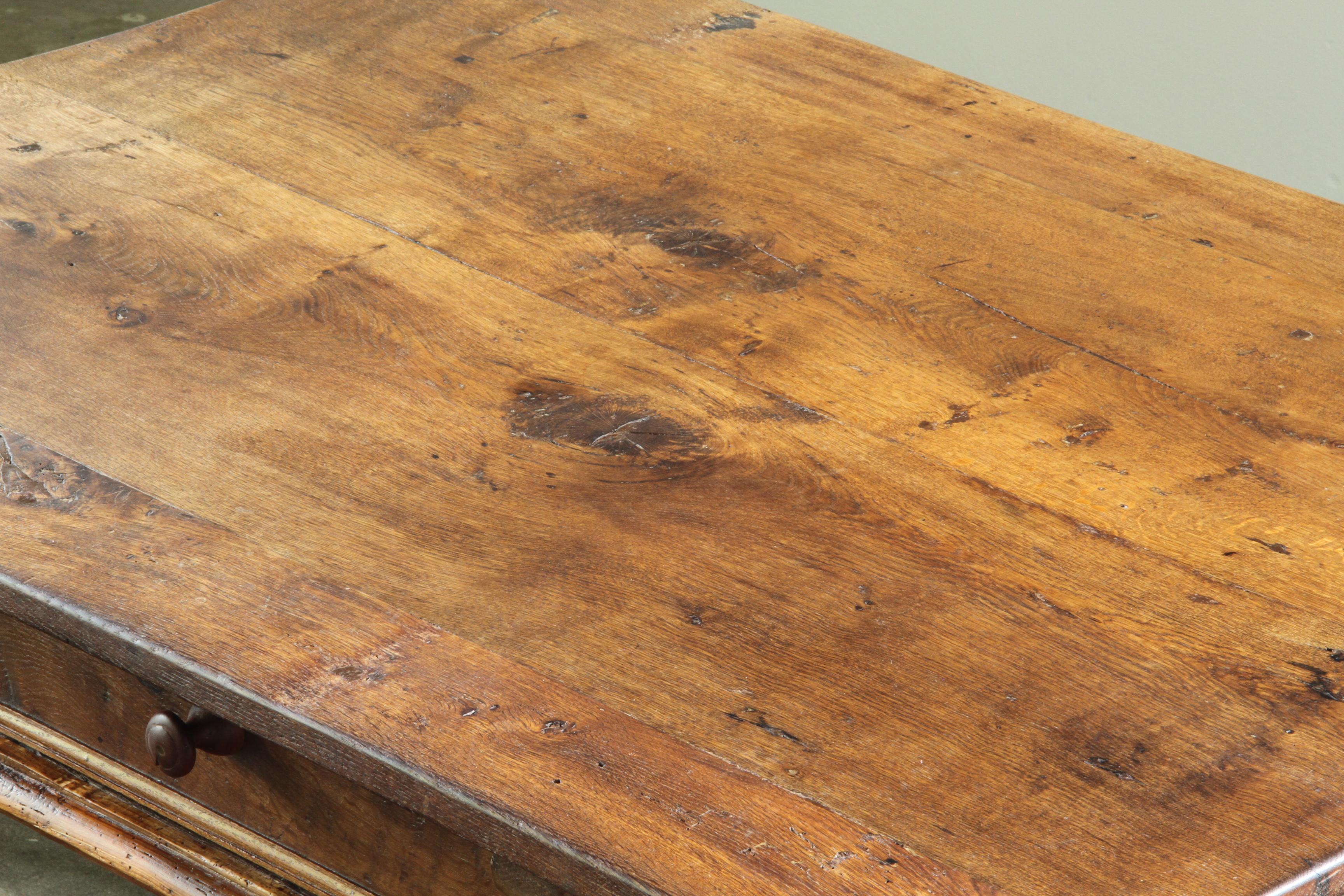 Antique_Solid_Oak_Farmhouse_Tavern_Table_with_Baroque_Details_and_Drawer