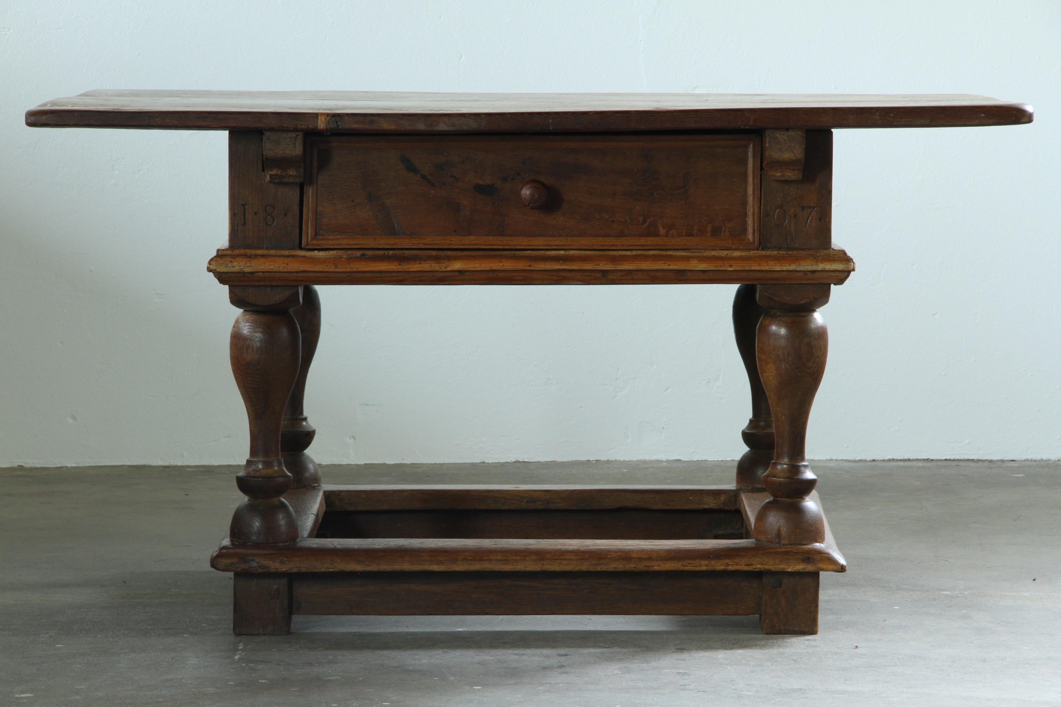 Antique_Solid_Oak_Farmhouse_Tavern_Table_with_Baroque_Details_and_Drawer