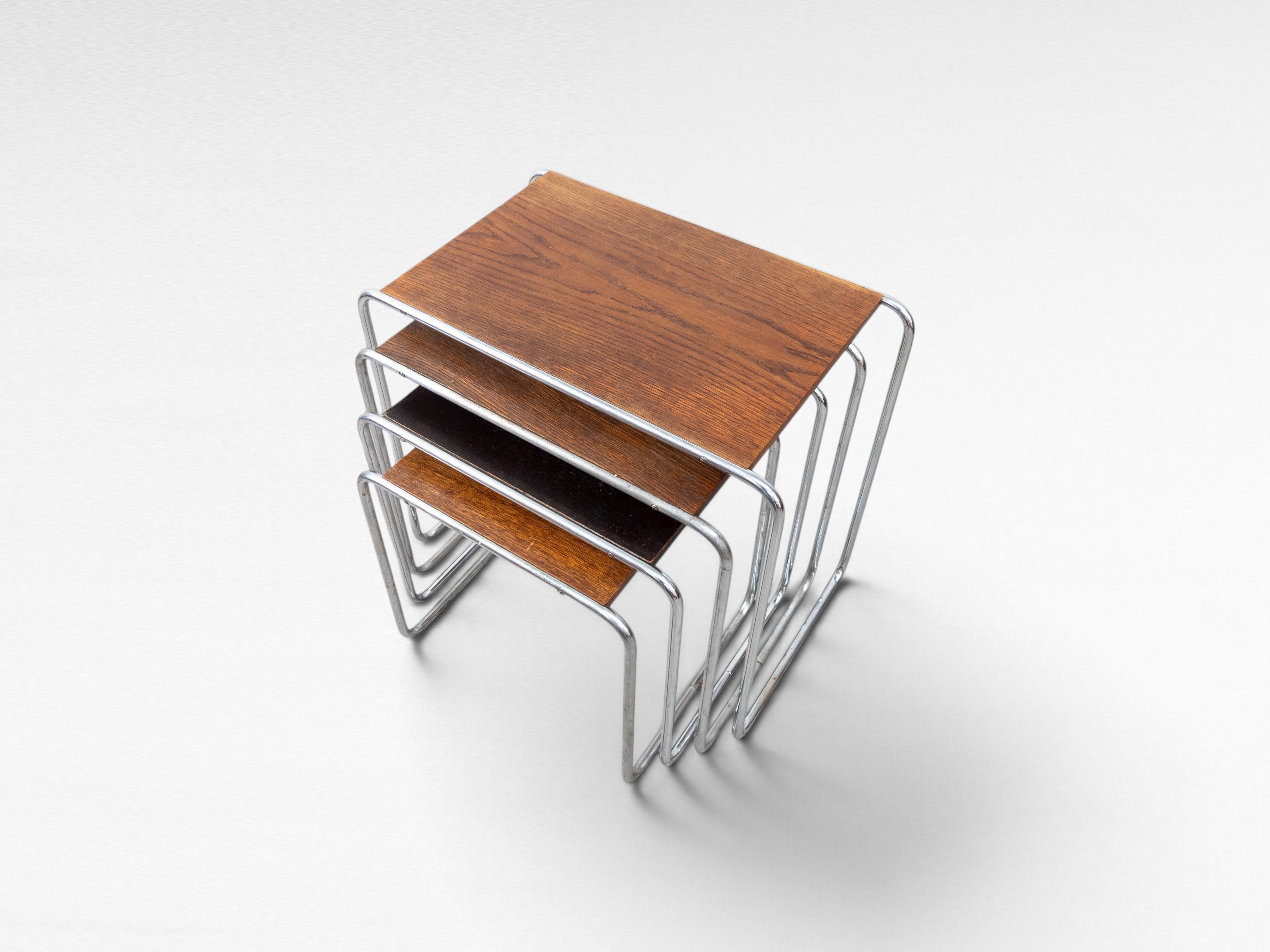 Set_of_4_Marcel_Breuer_B9_Bauhaus_Nesting_Tables_in_Tubular_Steel_and_Wood,_Czechoslovakia,_1930s