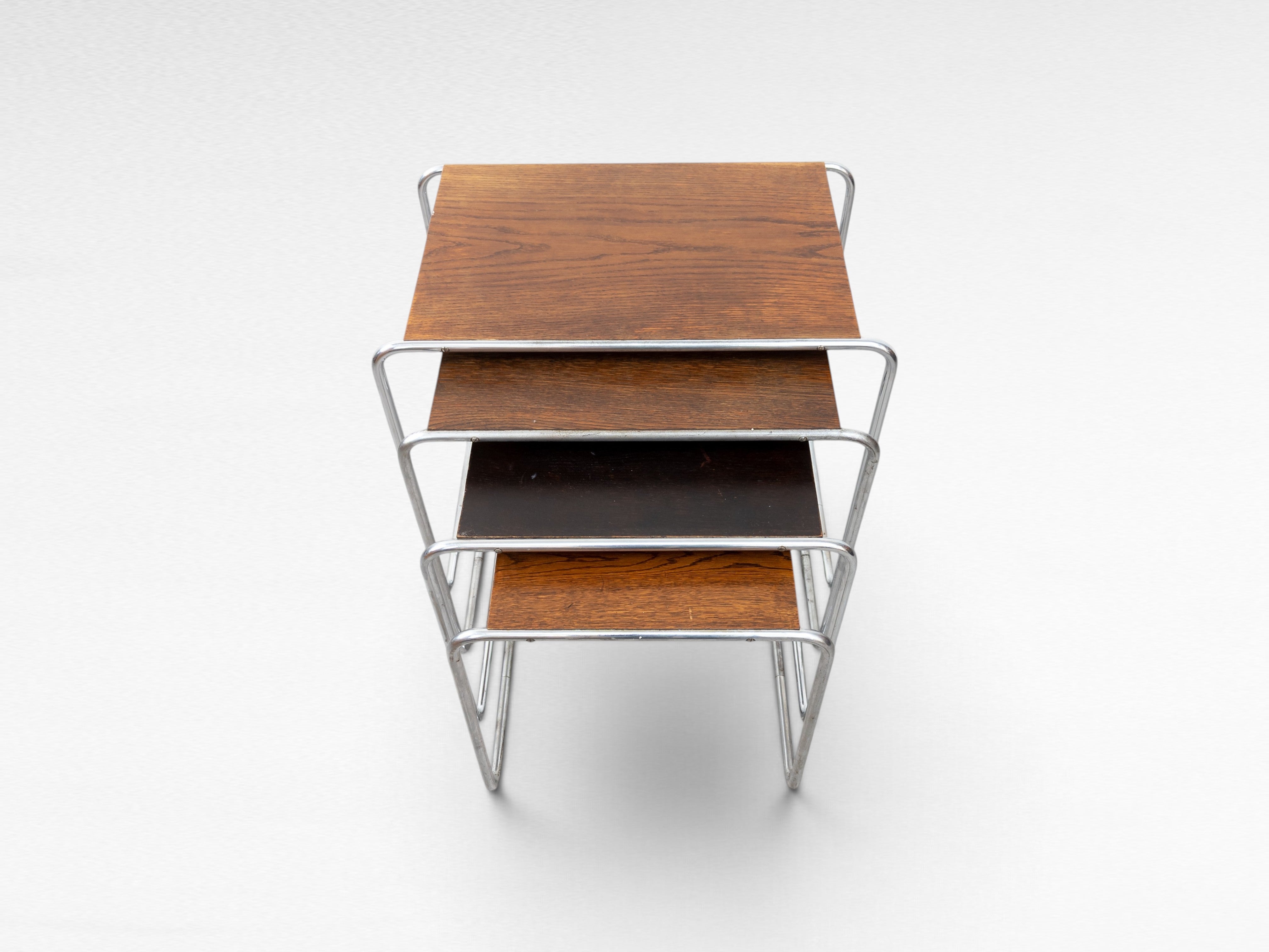 Set_of_4_Marcel_Breuer_B9_Bauhaus_Nesting_Tables_in_Tubular_Steel_and_Wood,_Czechoslovakia,_1930s