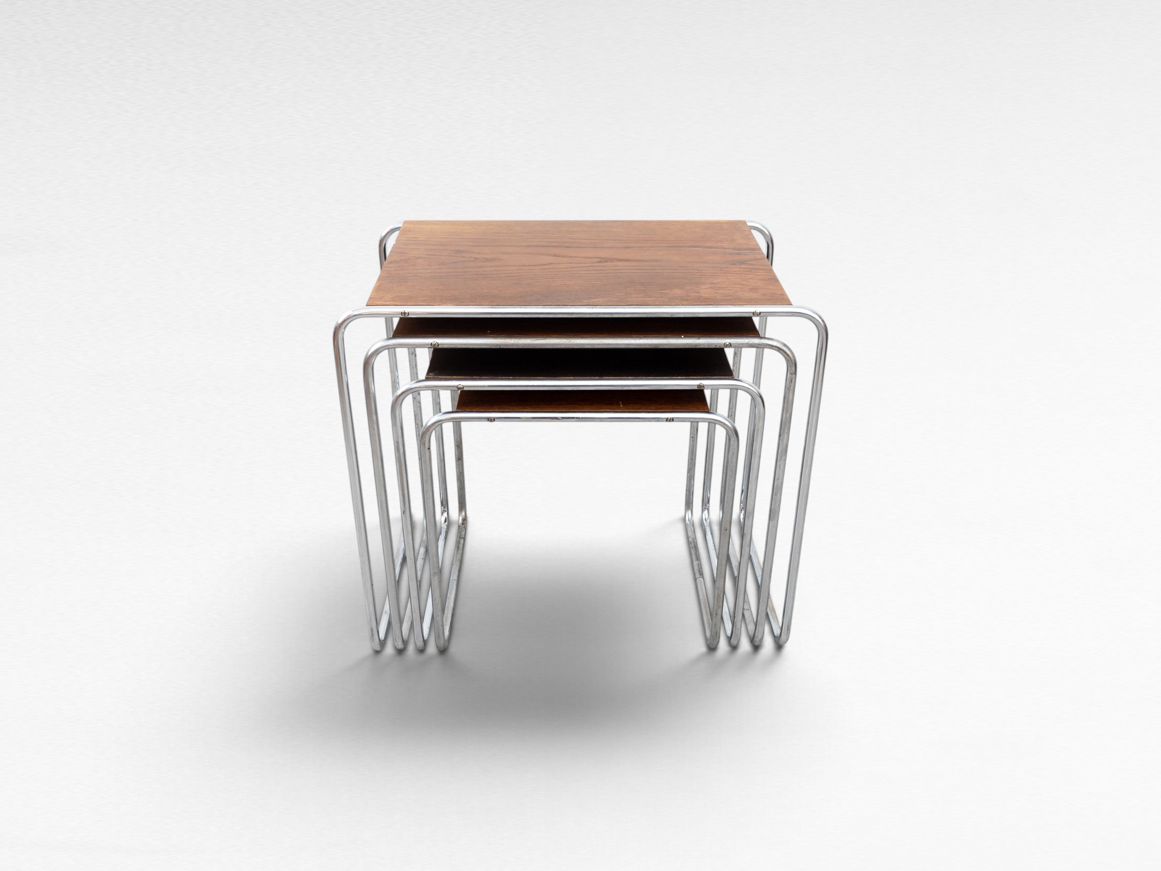 Set_of_4_Marcel_Breuer_B9_Bauhaus_Nesting_Tables_in_Tubular_Steel_and_Wood,_Czechoslovakia,_1930s
