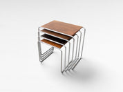 Set_of_4_Marcel_Breuer_B9_Bauhaus_Nesting_Tables_in_Tubular_Steel_and_Wood,_Czechoslovakia,_1930s