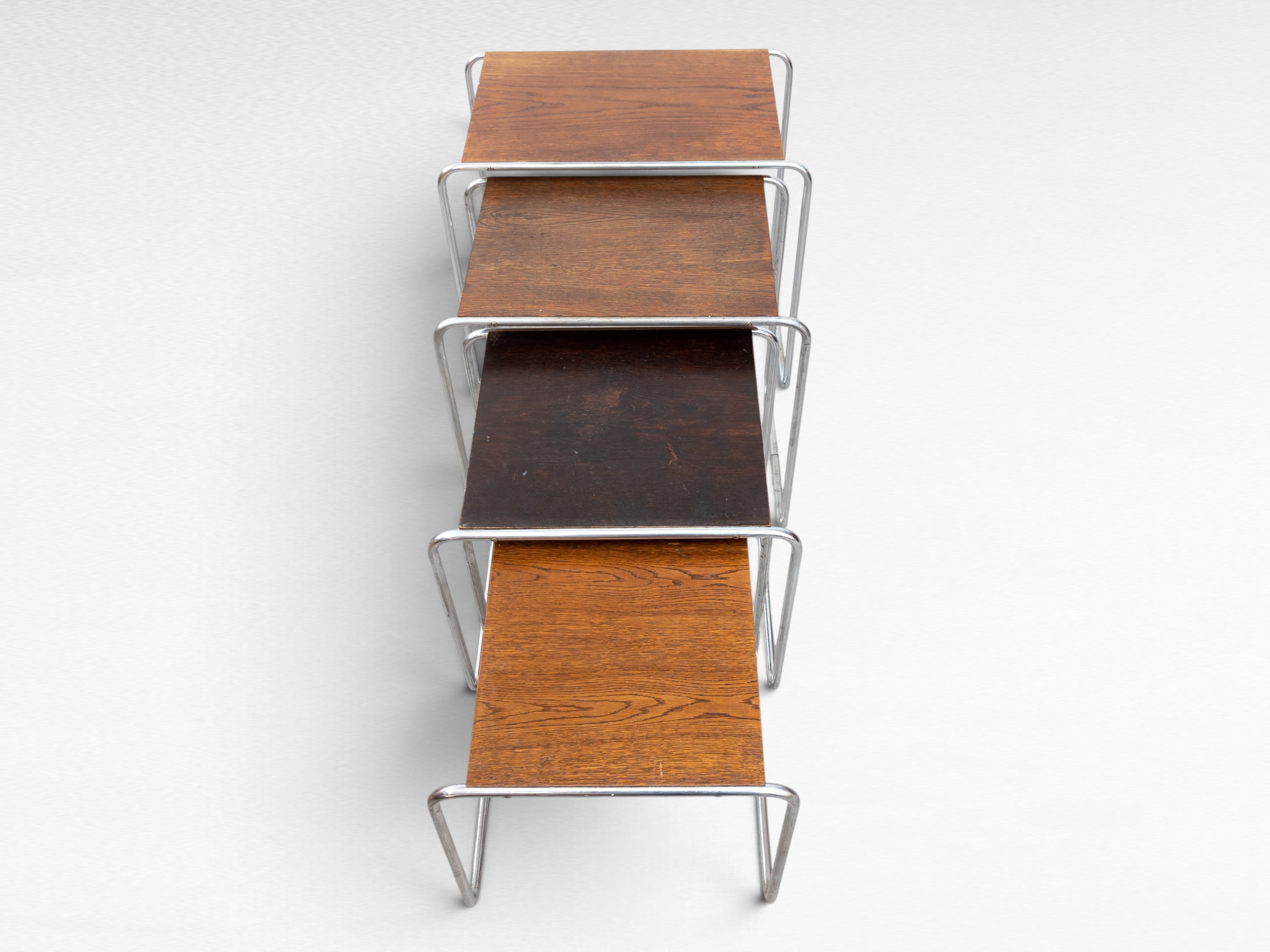 Set_of_4_Marcel_Breuer_B9_Bauhaus_Nesting_Tables_in_Tubular_Steel_and_Wood,_Czechoslovakia,_1930s
