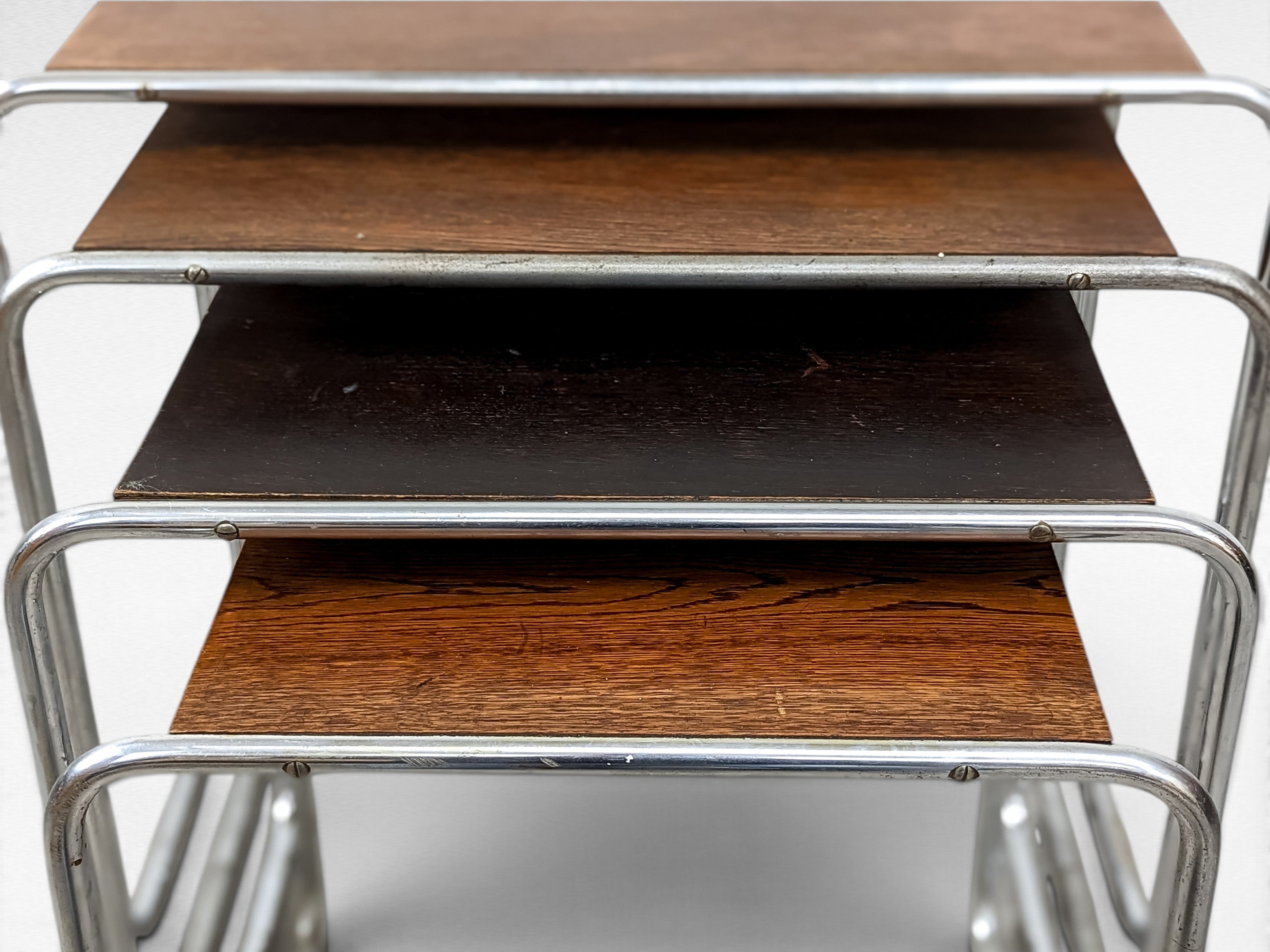 Set_of_4_Marcel_Breuer_B9_Bauhaus_Nesting_Tables_in_Tubular_Steel_and_Wood,_Czechoslovakia,_1930s