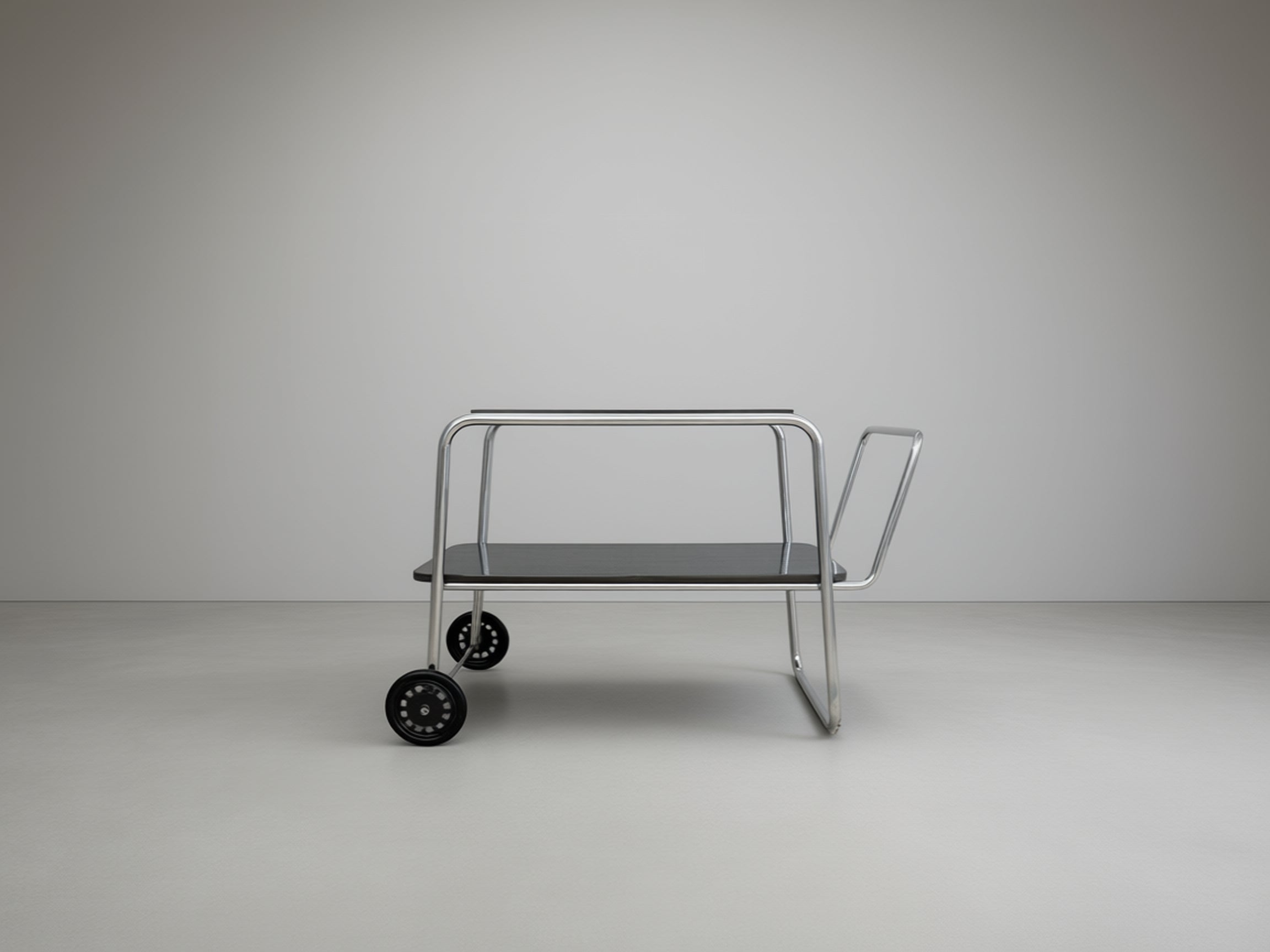 Bauhaus_tubular_steel_serving_cart_by_Robert_Slezák,_1930s