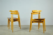 Set_of_4_Beech_&_teak_dining_chairs,_by_Hans_J._Wegner_&_Fritz_Hansen,_Denmark_1950s