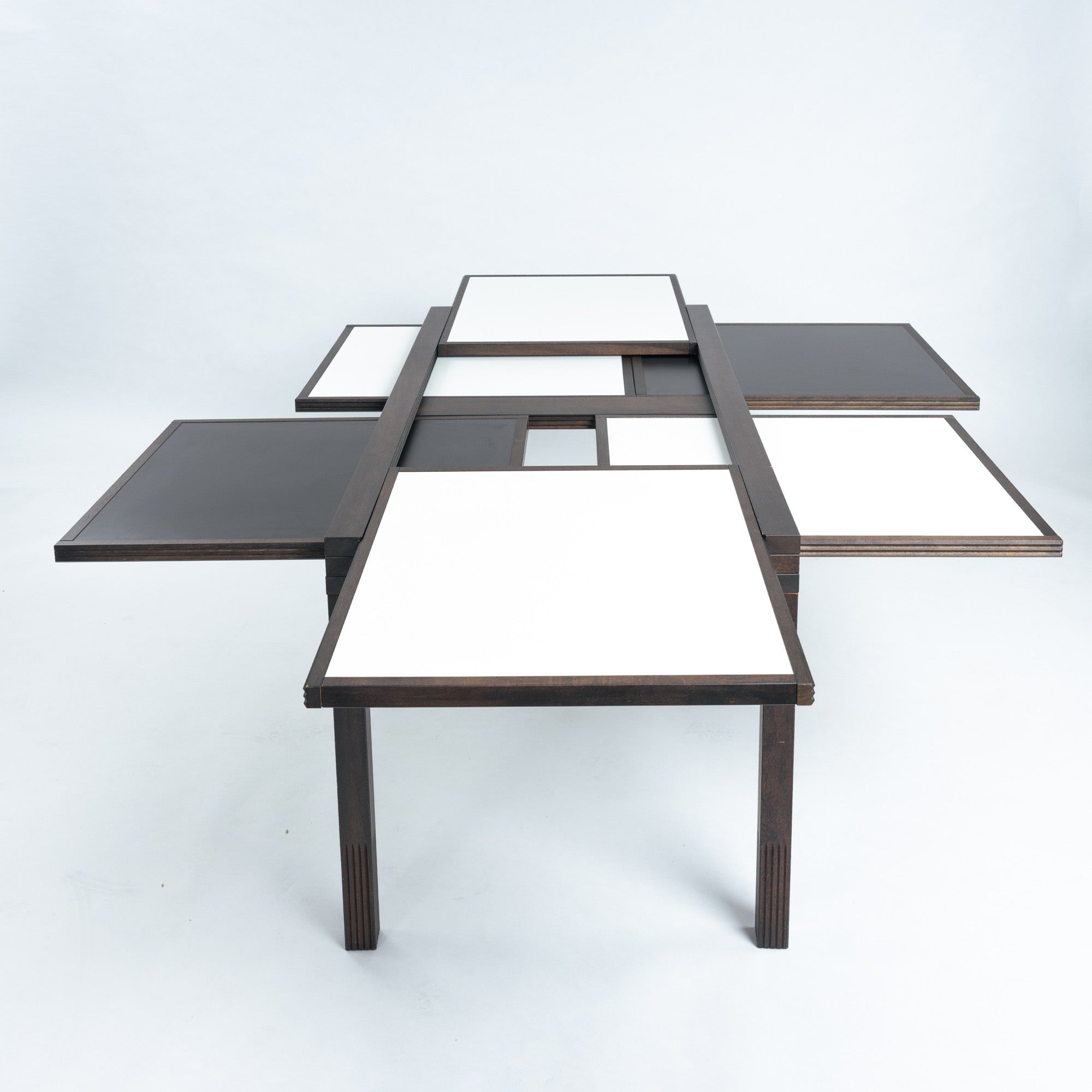 Bernard_Vuarnesson_dining_table_for_Bellato_with_reversible_and_extendible_tops,_1980s