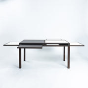 Bernard_Vuarnesson_dining_table_for_Bellato_with_reversible_and_extendible_tops,_1980s