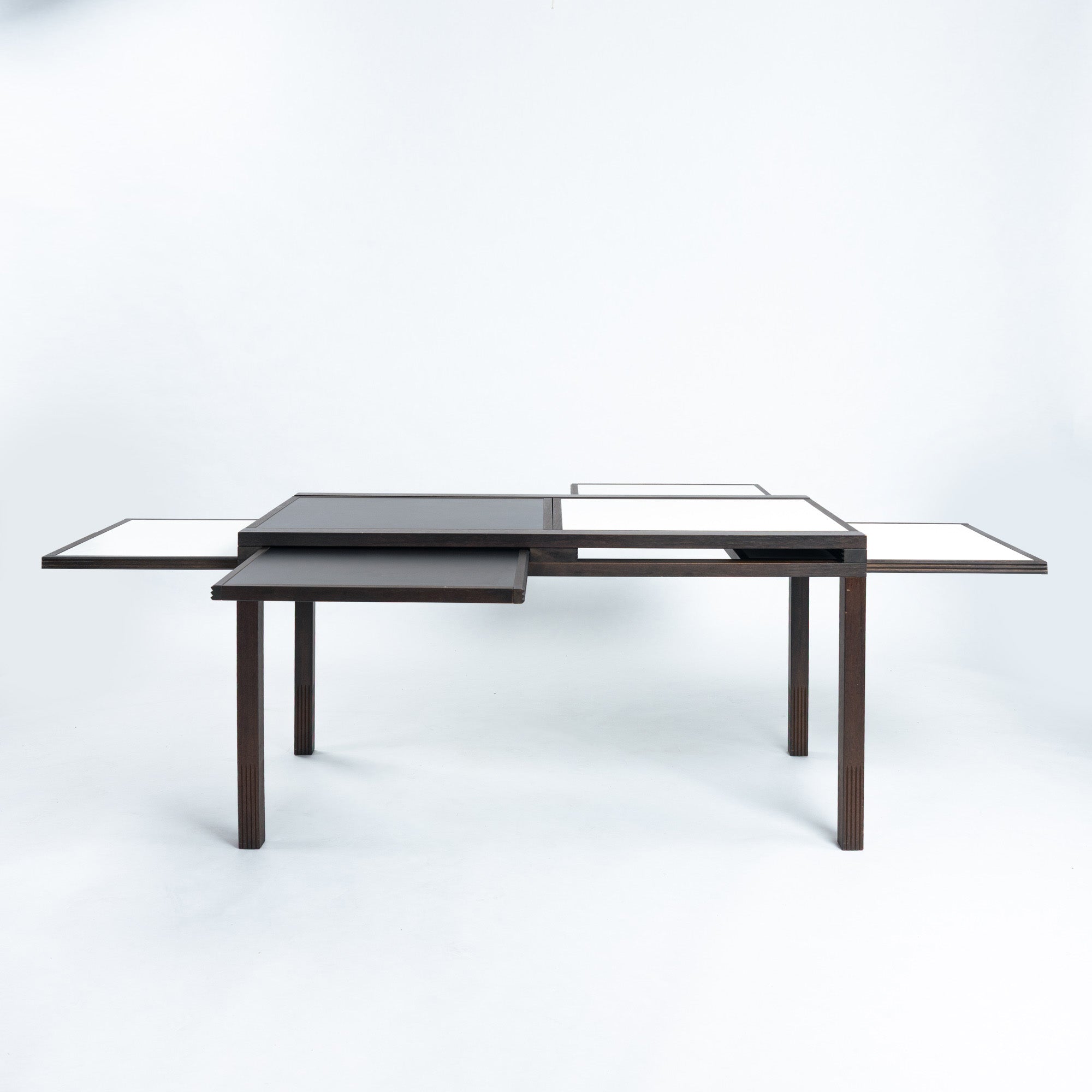 Bernard_Vuarnesson_dining_table_for_Bellato_with_reversible_and_extendible_tops,_1980s