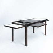 Bernard_Vuarnesson_dining_table_for_Bellato_with_reversible_and_extendible_tops,_1980s