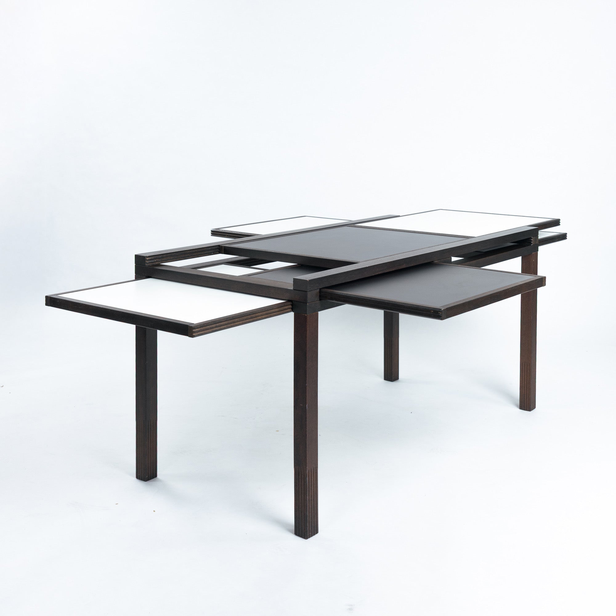 Bernard_Vuarnesson_dining_table_for_Bellato_with_reversible_and_extendible_tops,_1980s