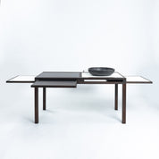 Bernard_Vuarnesson_dining_table_for_Bellato_with_reversible_and_extendible_tops,_1980s
