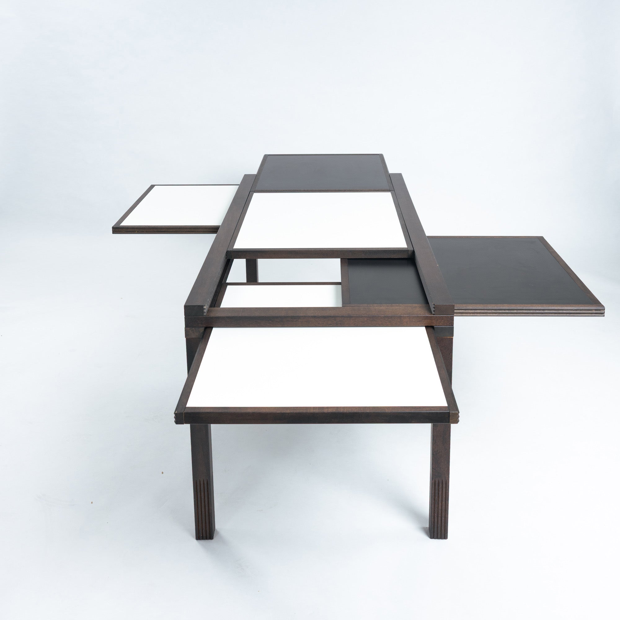 Bernard_Vuarnesson_dining_table_for_Bellato_with_reversible_and_extendible_tops,_1980s