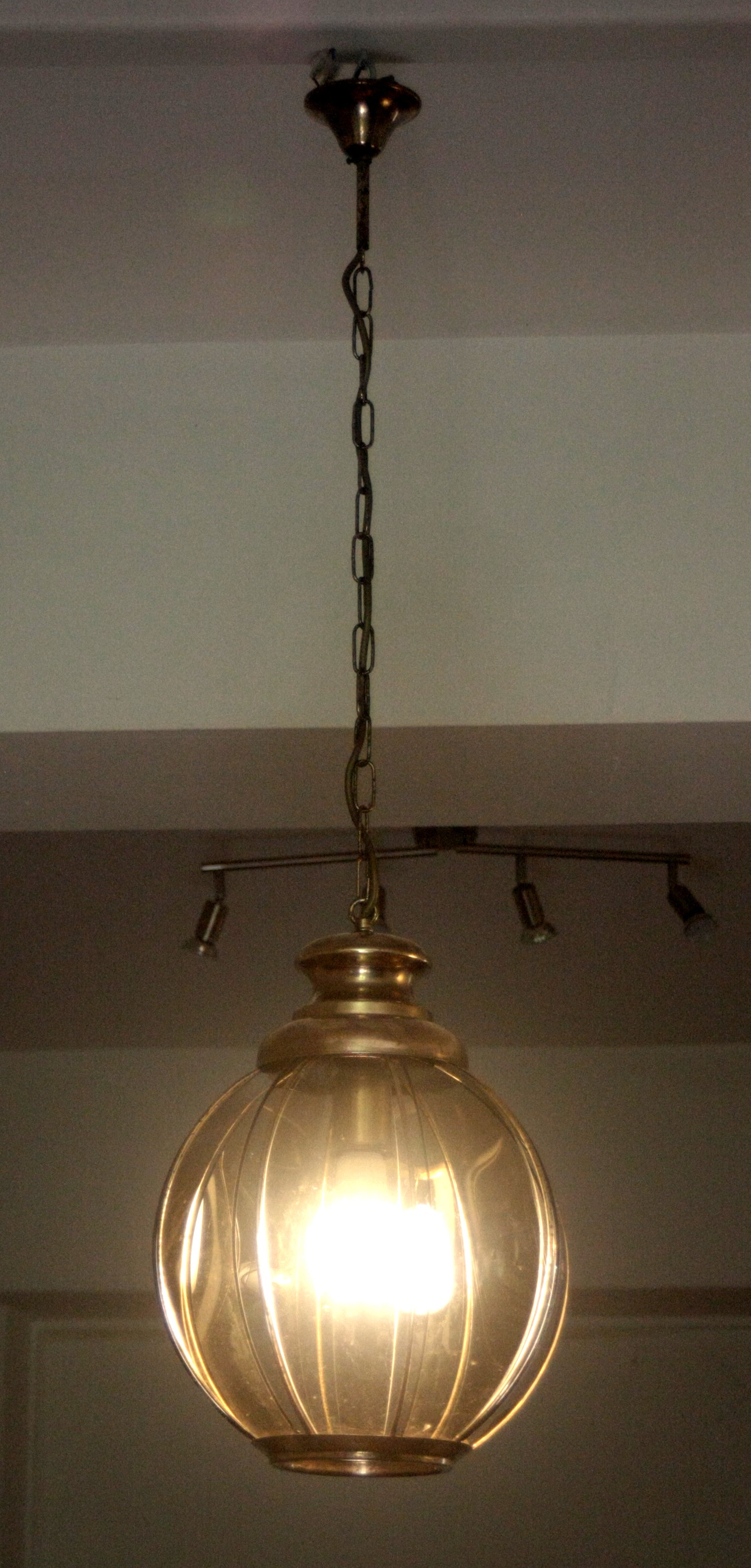 Brass_chandelier_with_smoked_glass_segments,_second_half_of_the_20th_century