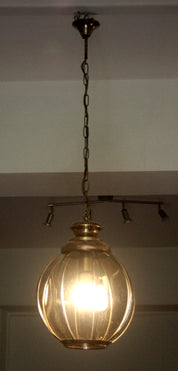 Brass_chandelier_with_smoked_glass_segments,_second_half_of_the_20th_century