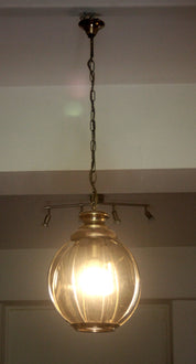 Brass_chandelier_with_smoked_glass_segments,_second_half_of_the_20th_century