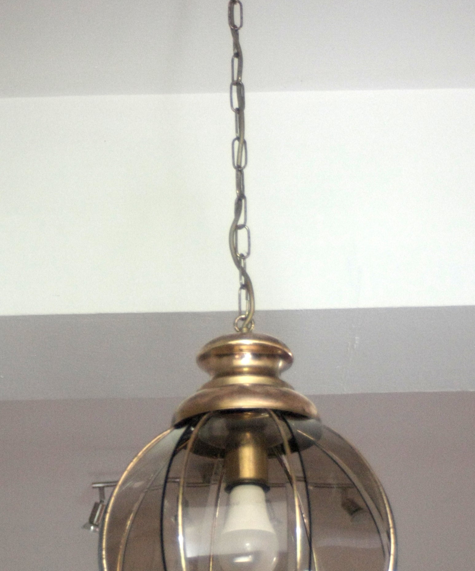 Brass_chandelier_with_smoked_glass_segments,_second_half_of_the_20th_century