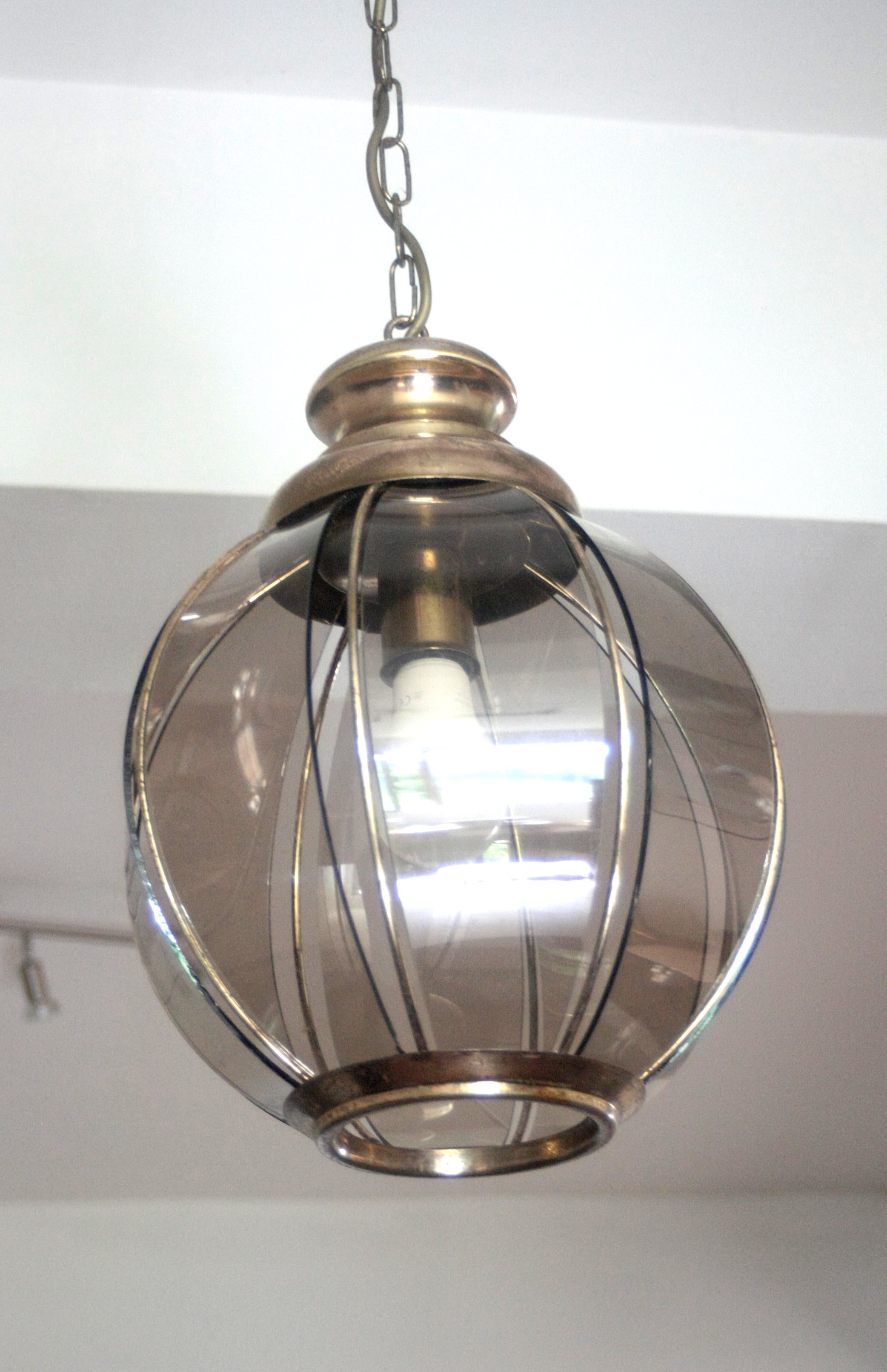 Brass_chandelier_with_smoked_glass_segments,_second_half_of_the_20th_century
