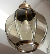 Brass_chandelier_with_smoked_glass_segments,_second_half_of_the_20th_century