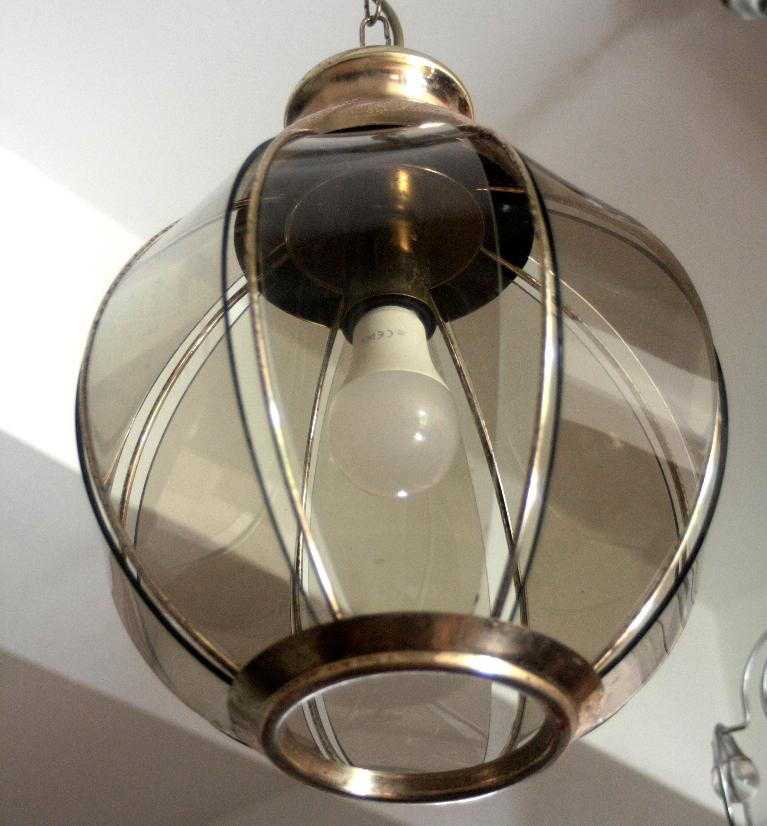 Brass_chandelier_with_smoked_glass_segments,_second_half_of_the_20th_century