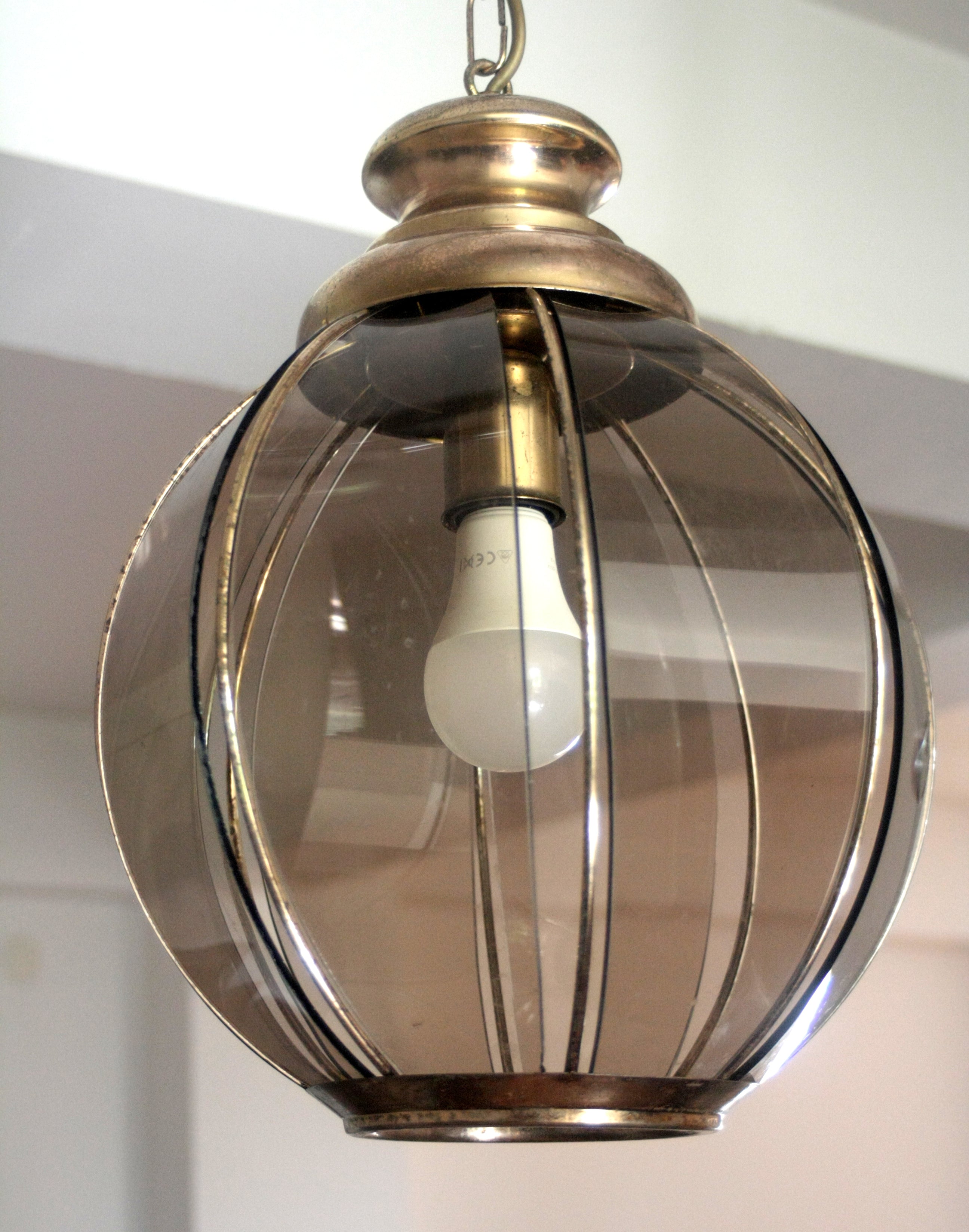 Brass_chandelier_with_smoked_glass_segments,_second_half_of_the_20th_century