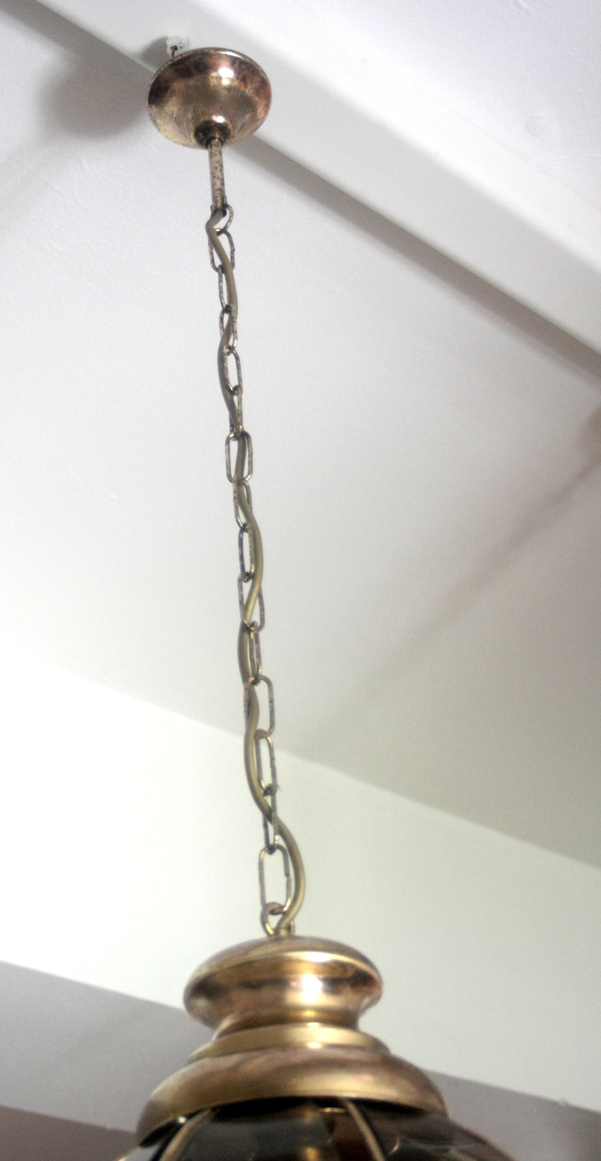 Brass_chandelier_with_smoked_glass_segments,_second_half_of_the_20th_century