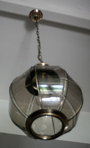 Brass_chandelier_with_smoked_glass_segments,_second_half_of_the_20th_century