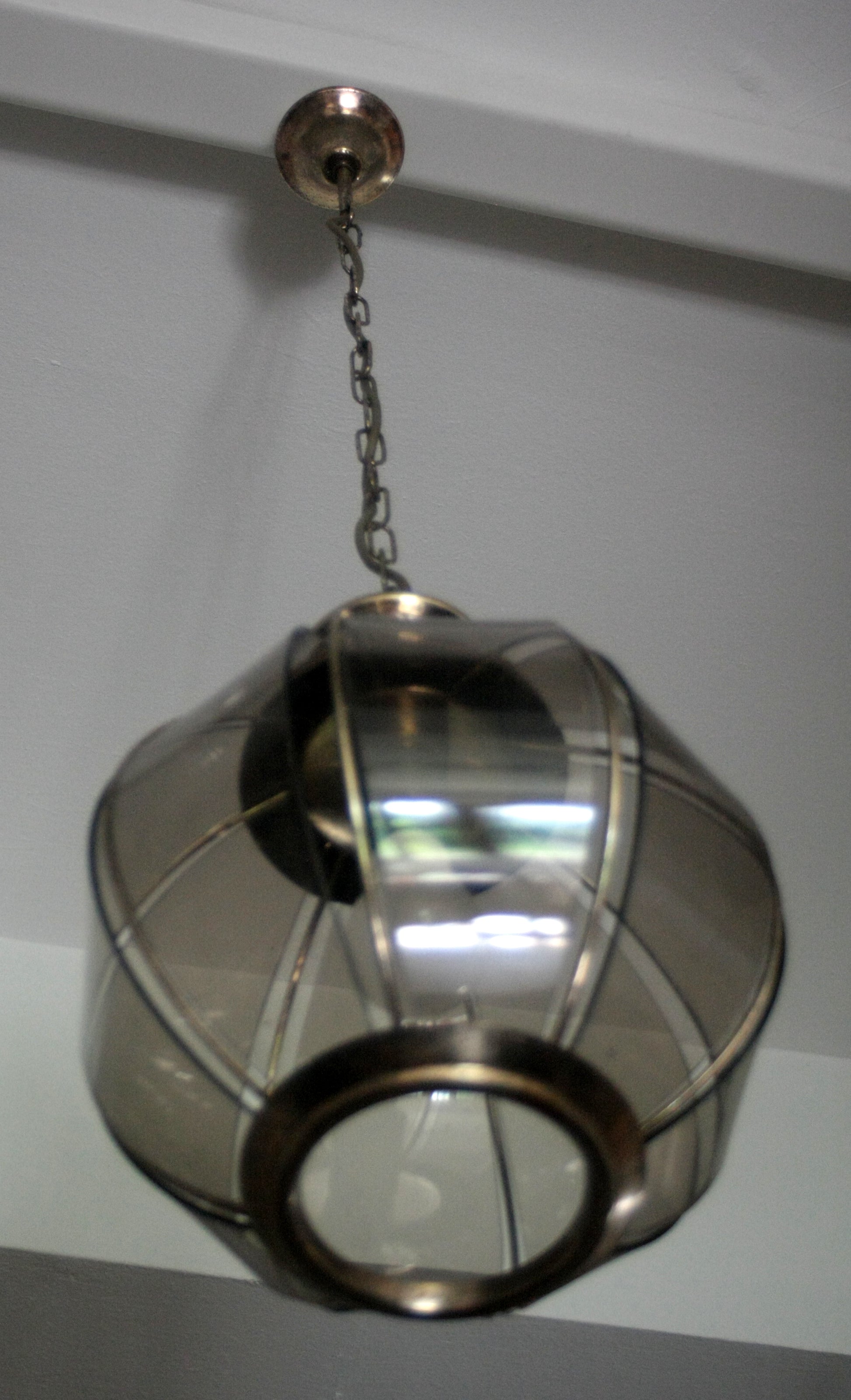 Brass_chandelier_with_smoked_glass_segments,_second_half_of_the_20th_century