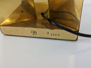 Brass_design_lamp_stamped_and_numbered_1970s