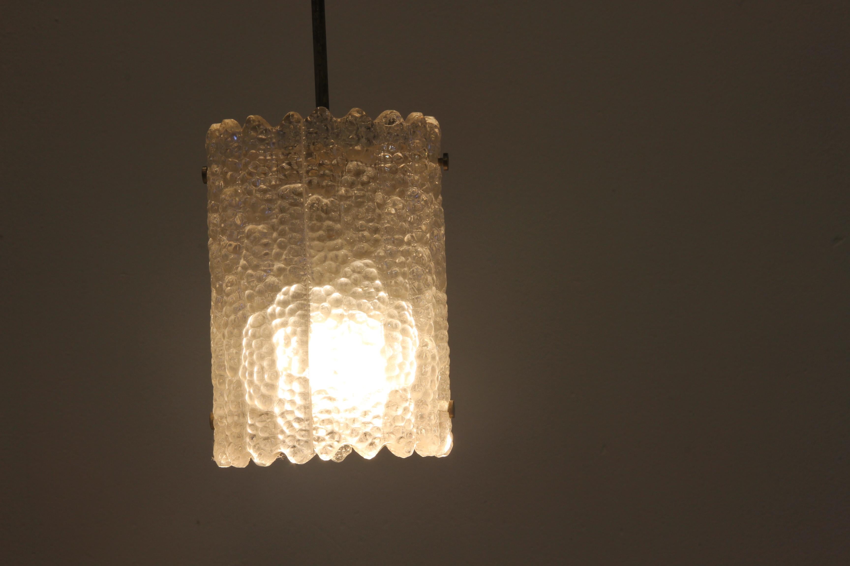 Carl_Fagerlund_Crystal_Glass_and_Brass_Pendant_Lamp_for_Orrefors,_Sweden,_1960s
