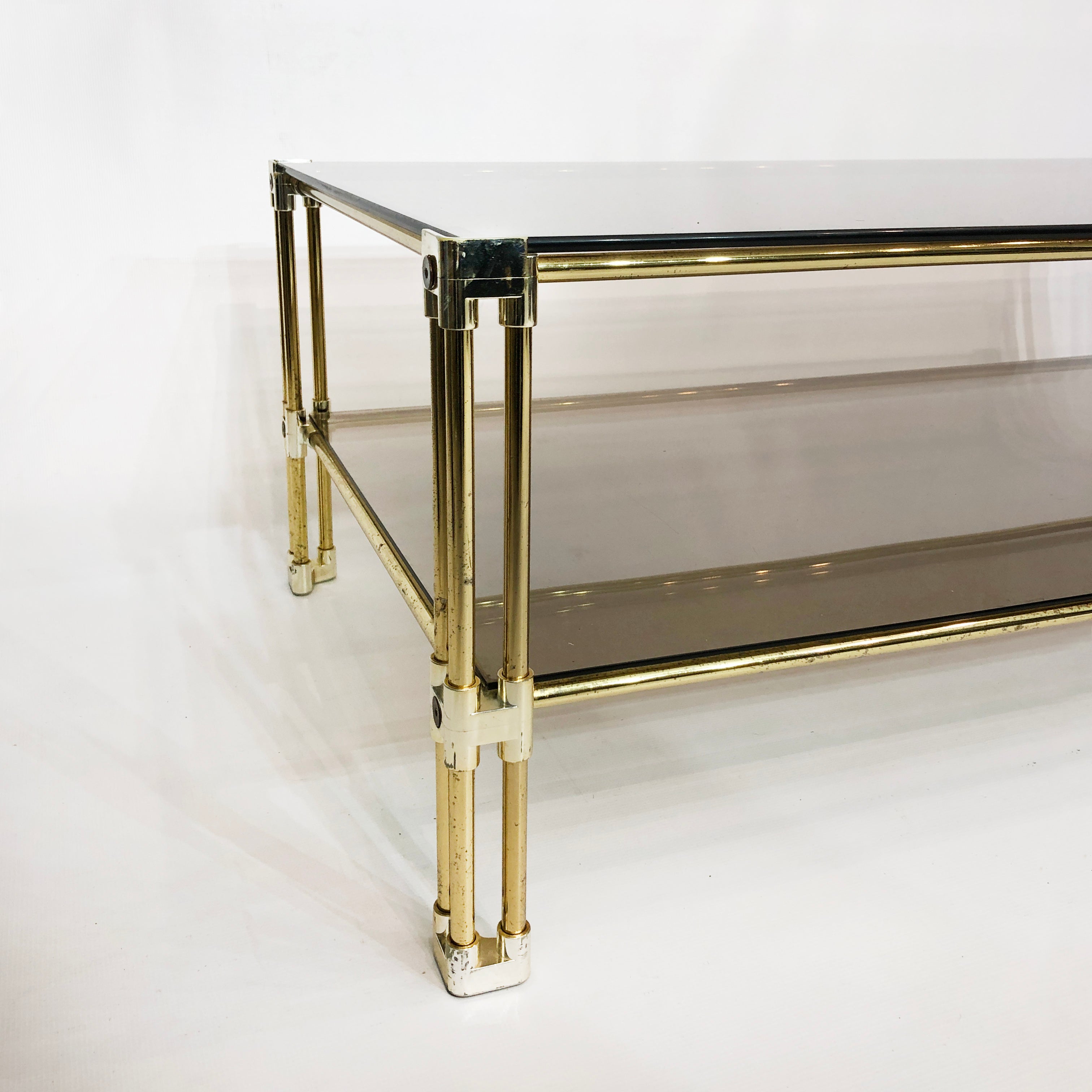 Brass_Two_Tiered_Coffee_Table_Hollywood_Regency_Gold_Smoked_Glass_1970s_Glamour