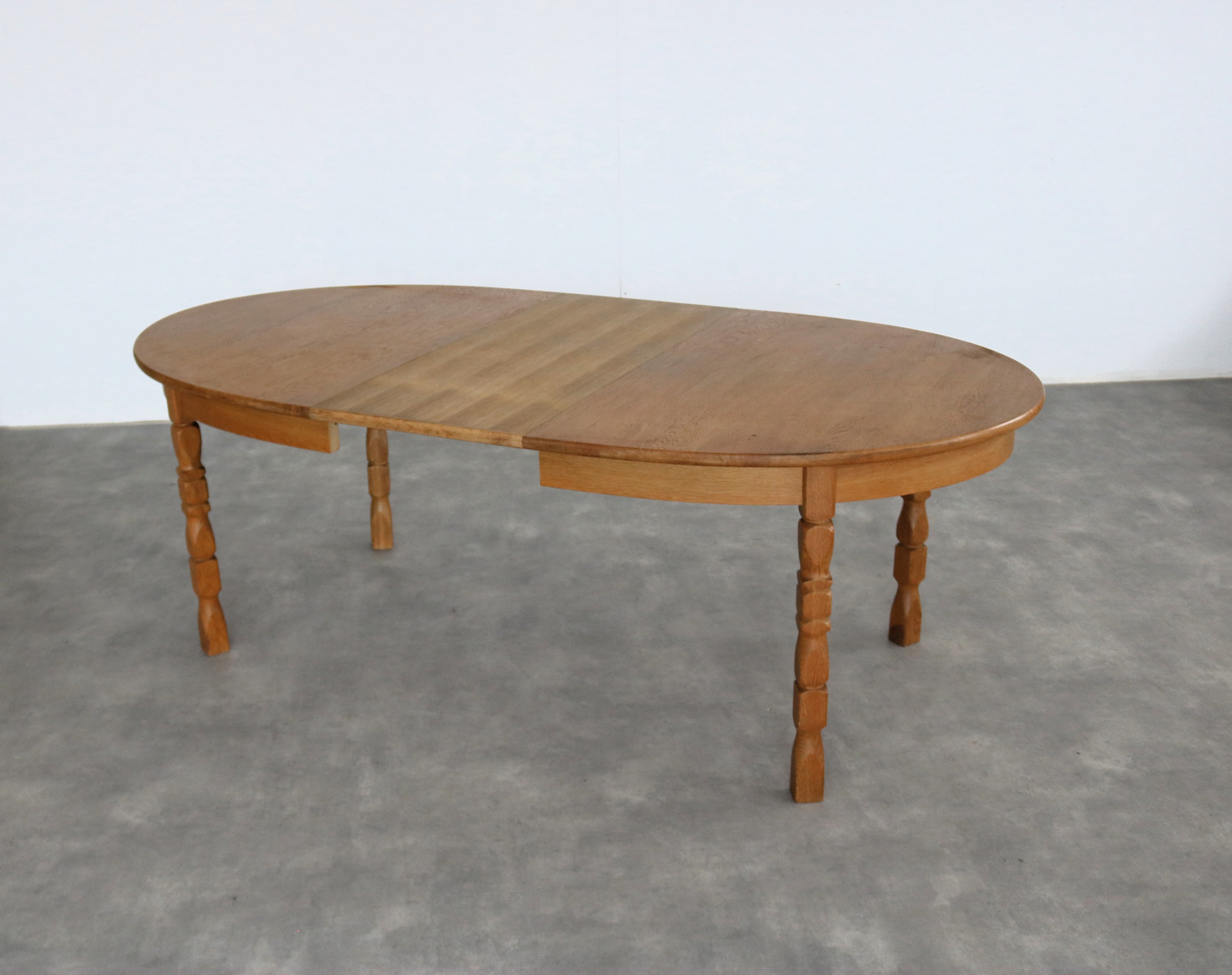 Brutalist_extendable_dining_table_by_Kjaernulf