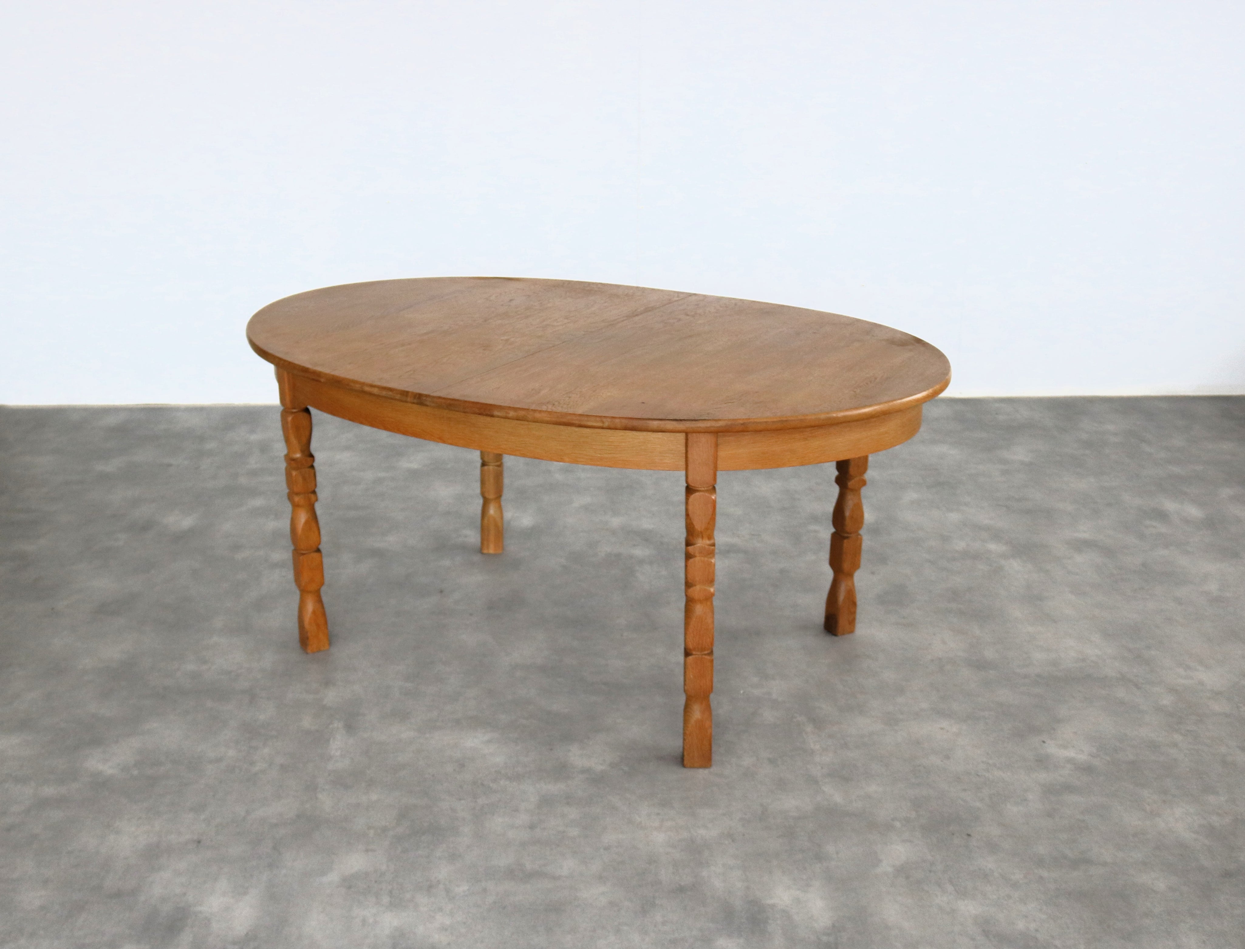 Brutalist_extendable_dining_table_by_Kjaernulf
