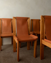 Set_of_7_Luigi_Gorgoni_Brutalist_Dining_Chairs_for_Roche_Bobois_in_Elm_and_Leather,_France,_1970s