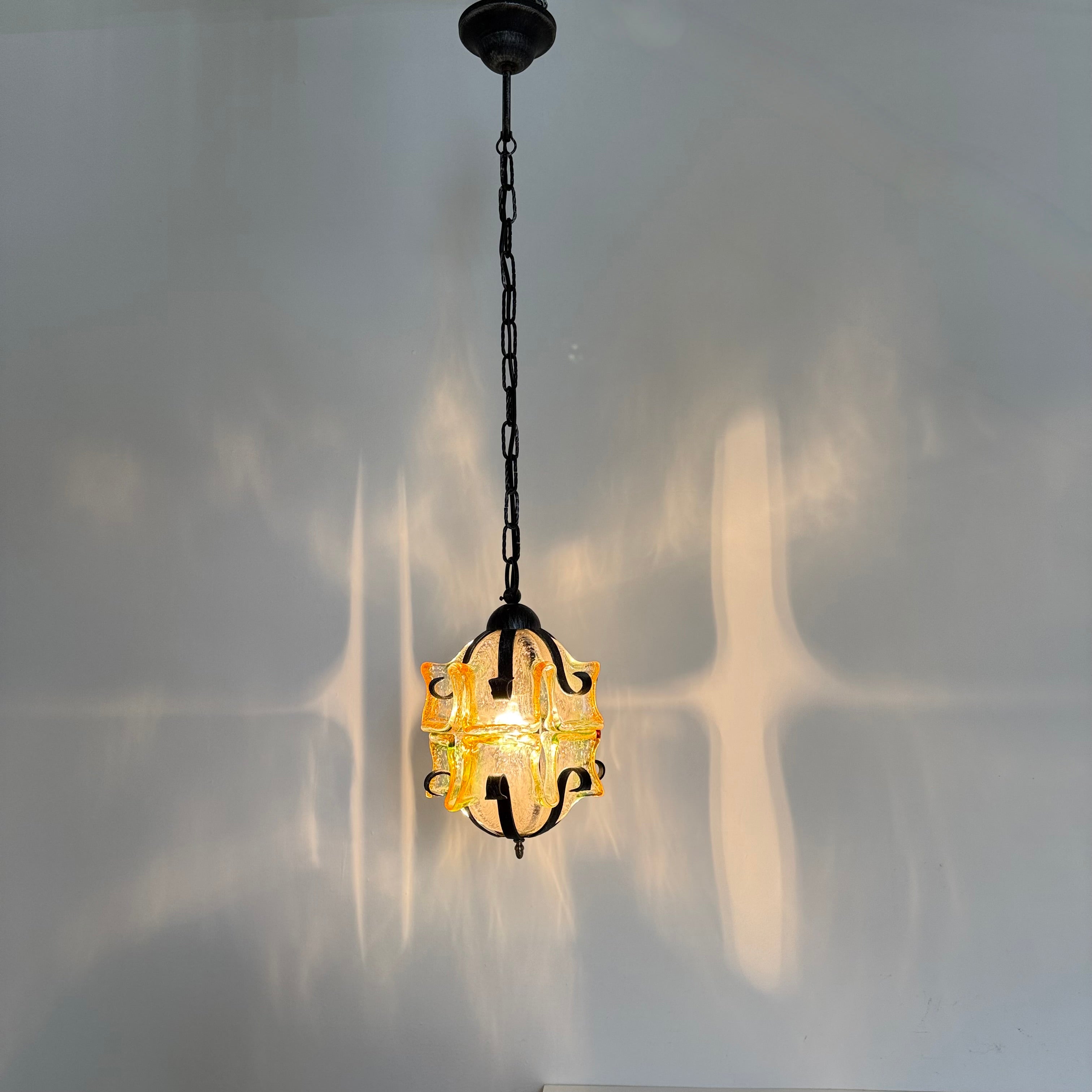 Brutalist_Glass_and_Iron_Pendant_Lamp,_1970s