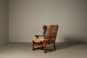 Set_of_Brutalist_Solid_Oak_Lounge_Chair_and_Matching_Ottoman_with_Original_Goat_Hide_Upholstery,_1960s
