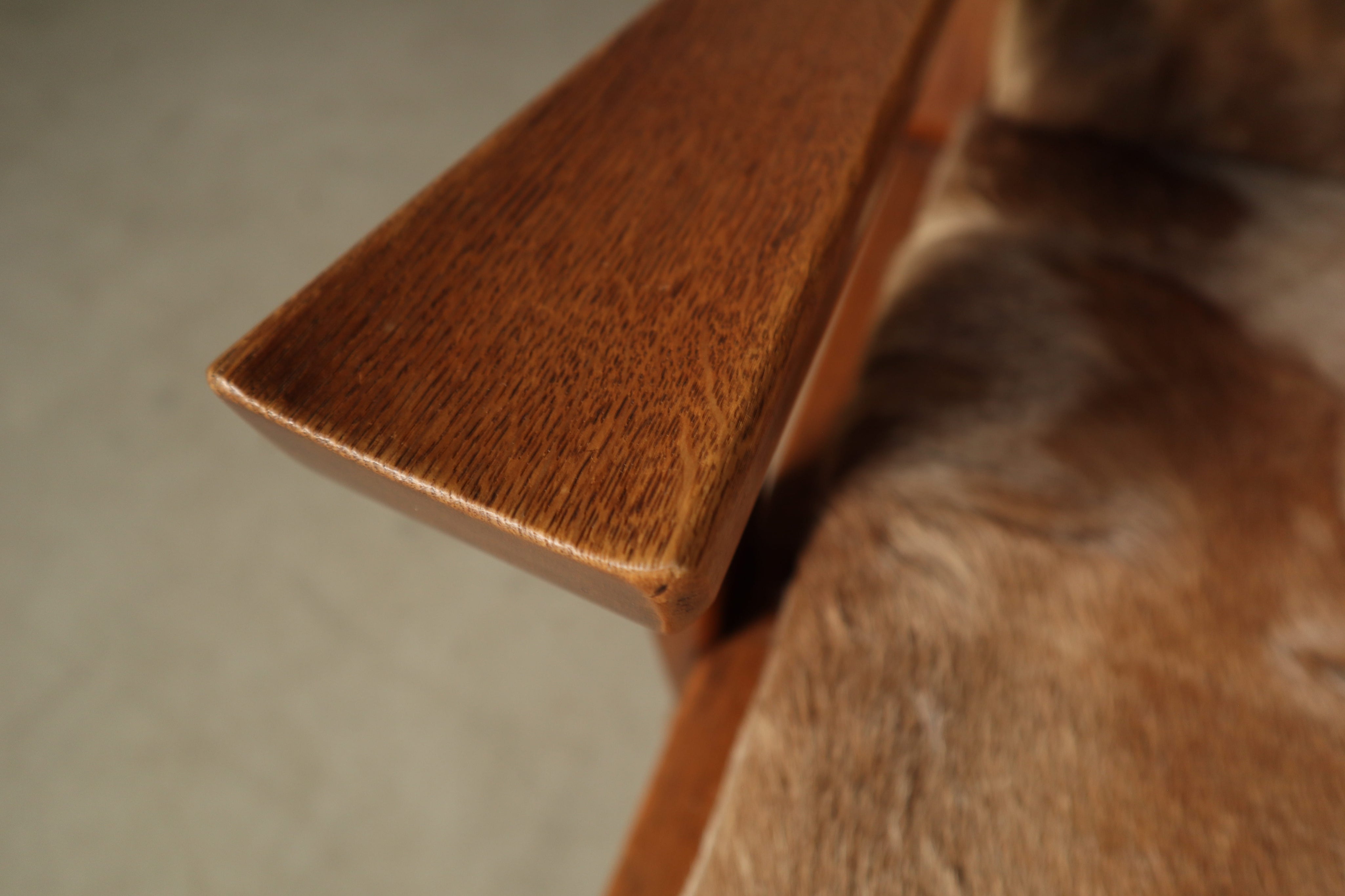 Set_of_Brutalist_Solid_Oak_Lounge_Chair_and_Matching_Ottoman_with_Original_Goat_Hide_Upholstery,_1960s