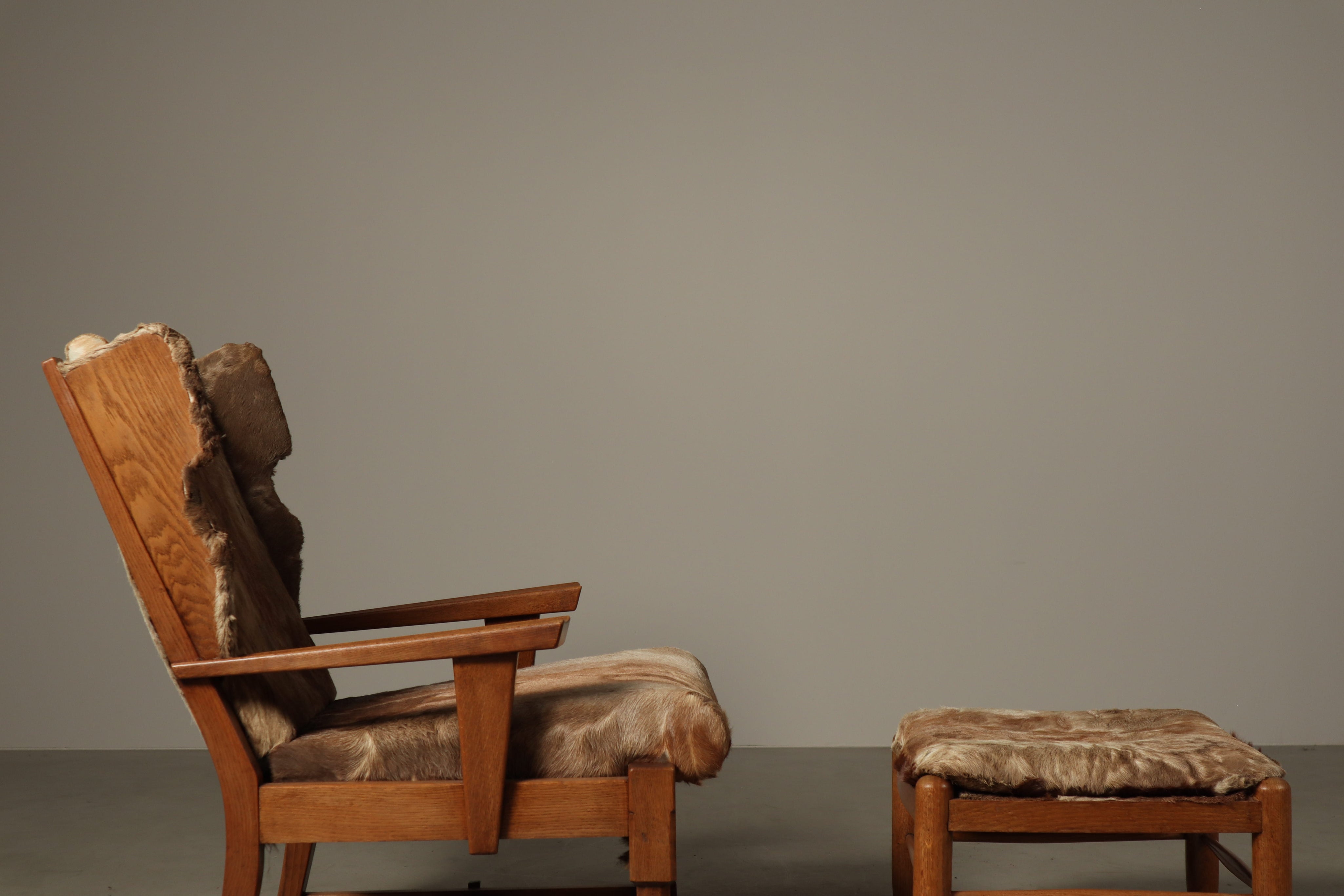 Set_of_Brutalist_Solid_Oak_Lounge_Chair_and_Matching_Ottoman_with_Original_Goat_Hide_Upholstery,_1960s