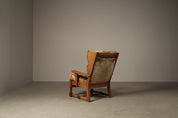 Set_of_Brutalist_Solid_Oak_Lounge_Chair_and_Matching_Ottoman_with_Original_Goat_Hide_Upholstery,_1960s
