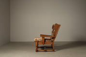 Set_of_Brutalist_Solid_Oak_Lounge_Chair_and_Matching_Ottoman_with_Original_Goat_Hide_Upholstery,_1960s